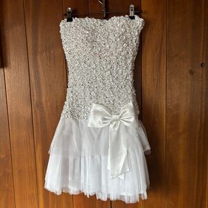 vintage 90s strapless mini dress with sequins, tulle skirt, and bow accent